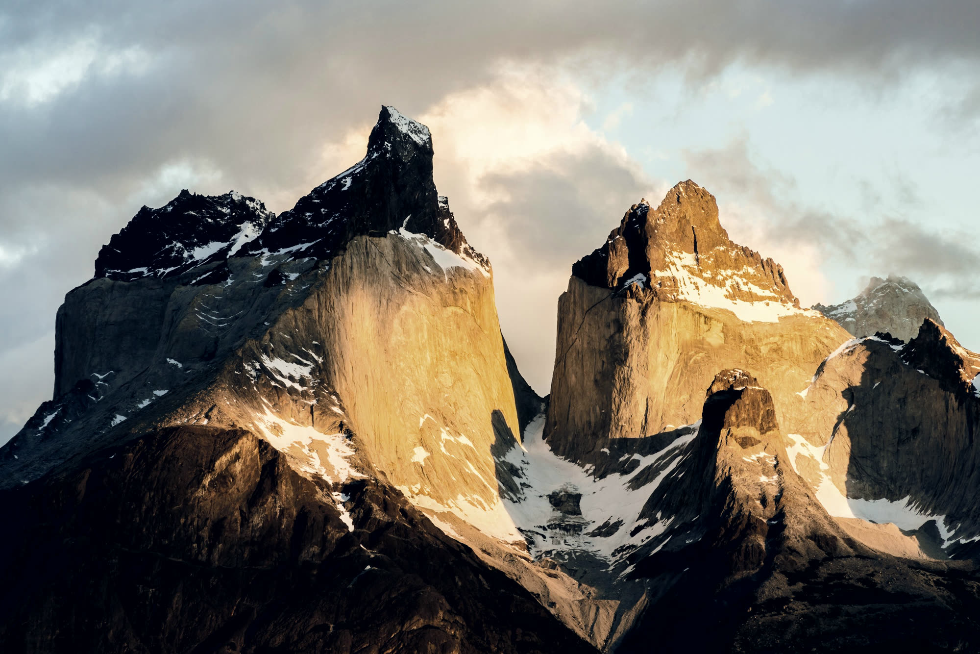 Low sun on the golden granite faces of the Cuernos del Paine.
